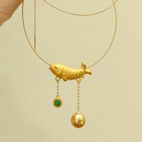 靈動(dòng)水中情 金龍魚(yú)與鯉魚(yú)的珠寶詩(shī)篇
